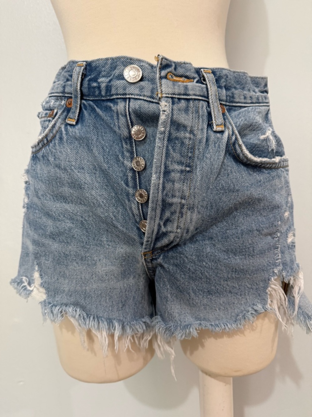 Agolde Distressed High-Rise Denim Shorts in Light Blue